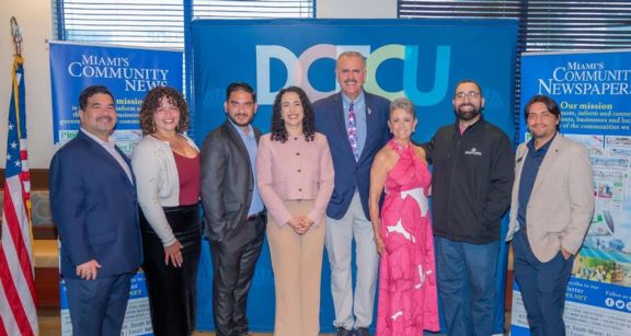 group picture with Ron Magil and DCFCU Business Development team