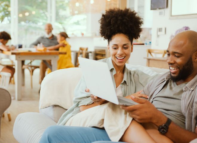 Couple looking at rate sheet