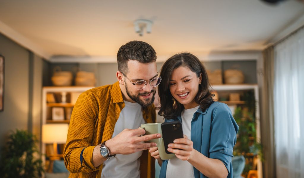 Couple in home on the phone