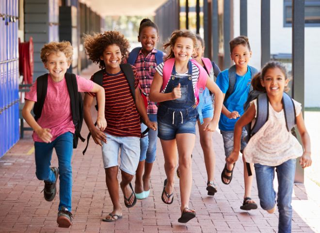 happy kids running in school