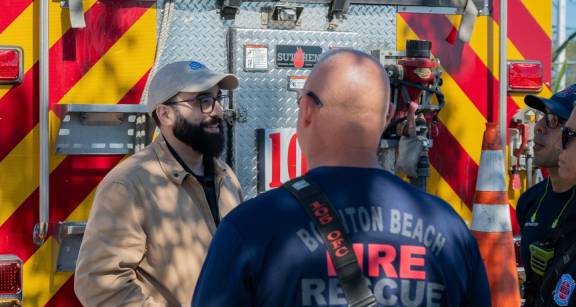 dcfcu employee speaking with Boyton Beach FD