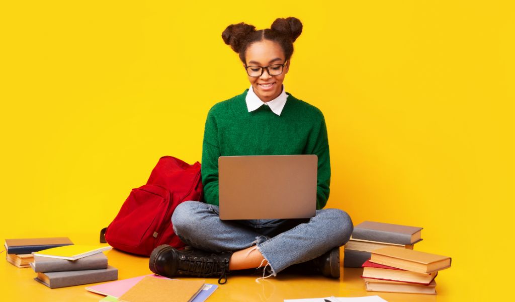 young student on her laptop
