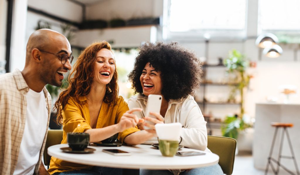 people sitting and laughing
