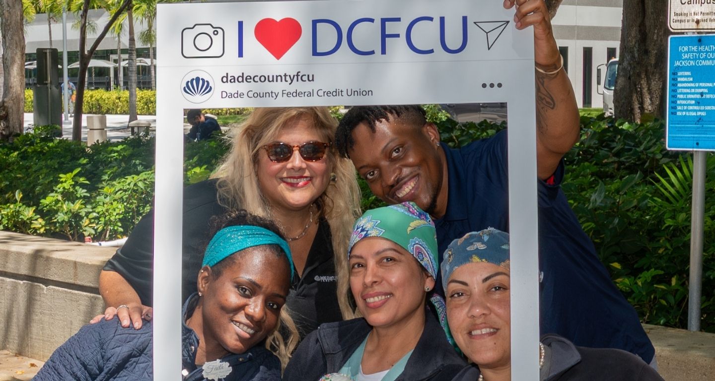 nurses with I love dcfcu sign