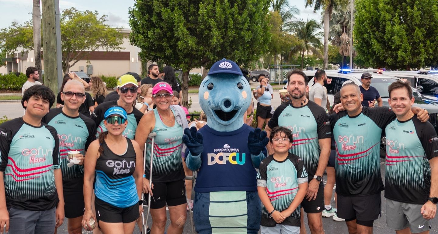 dcfcu mascot with runners