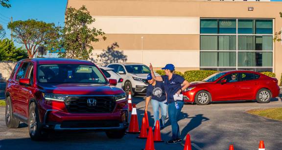 Cars lined up at DCFCU for turkey drive